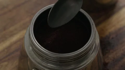 Adding Ground Coffee into a Moka Pot Stock Footage 292873484