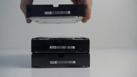 Adding hard disk drive in stack. Stock Footage 154060715