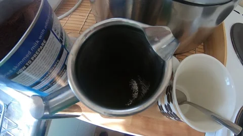 Adding Hot Water in A Coffee Pot Stock Footage 137826315