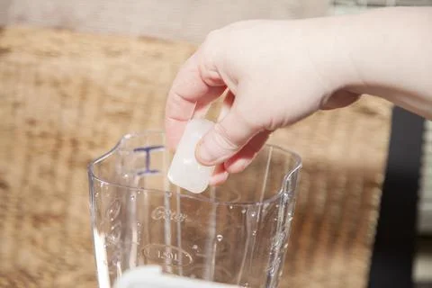 Adding Ice Cubes to Blender Stock Photos