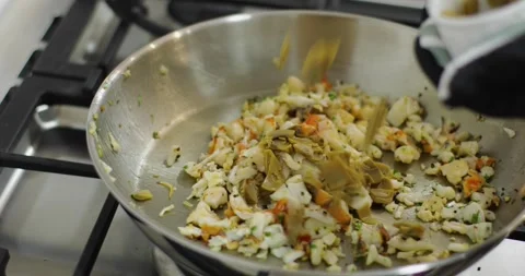 Adding ingredients into the pan 2 Video stock 287968089