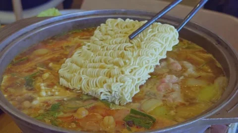 Adding Instant Noodles to Boiling Hot Pot Stock-Footage 314985025