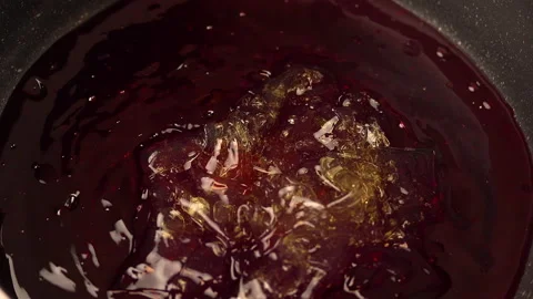 Adding jelly to melt into the pan. Stock Footage 141933065