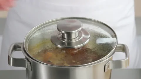 Adding leeks to the vegetable stock Stock Footage 24667394