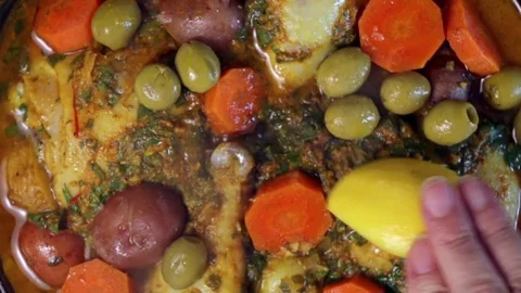 Adding Lemon Slices To Tajine Stock Footage 82983827