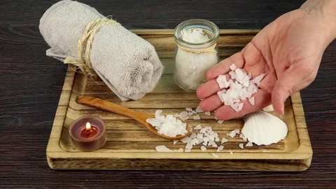 Adding Magnesium Chloride vitamin salt in foot bath water, solution. Stock-Footage 147329296