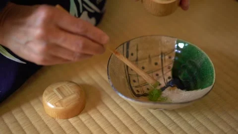 Adding matcha powder in tea ceremony Stock Footage 131244652