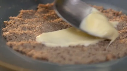 Adding mayo layer over canned fish - puff salad cooking Stock-Footage 121364398