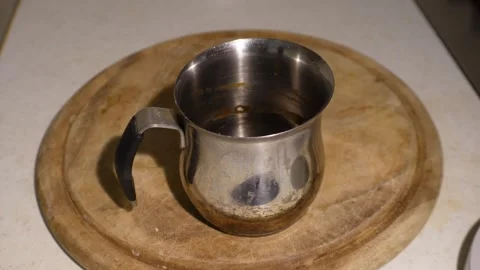 Adding milk to cooker C0042 Video stock 254967461