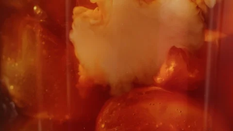 Adding milk in glass with coffee and ice macro shot Stock-Footage 128491467
