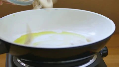 Adding mushrooms Stock Footage 70281856