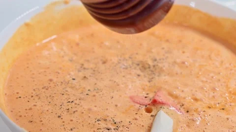 Adding the mustard to prepare the pudding Stock Footage 228220655
