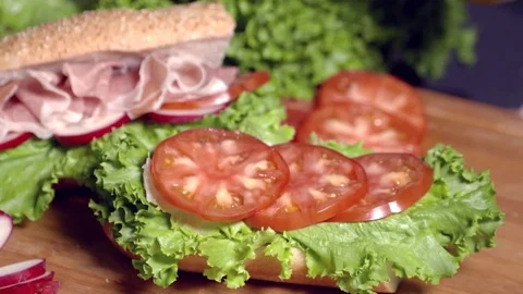 Adding oil for the beginning of a scrumptious sandwich.  Stock Footage 70725395