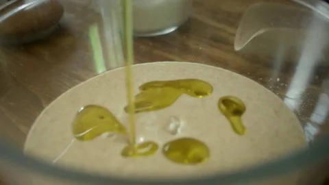 Adding oil Stock Footage 76792491