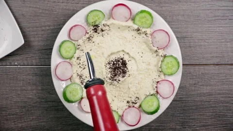 Adding Olive Oil To Baba Ghanoush Видео 82977088