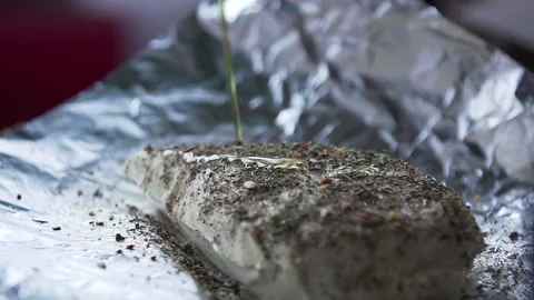 Adding olive oil to a tasty Paneer Close up Stock Footage 132997666