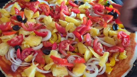 Adding Olives to Pizza Stock Footage 325391405