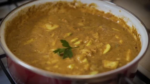 Adding Parsley to Home Style Carry Stock-Footage 113399437