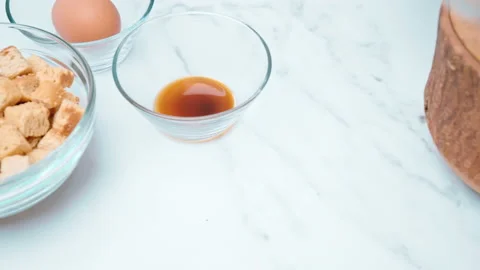 Adding pepper into a Caesar Salad Sauce mixture in a Mortar and pestle in 4K. Stock Footage 140766267