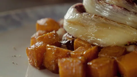 ADDING PEPPER TO RISOTTO WITH PUMPKIN AND RED RADICCHIO Stock Footage 135016655