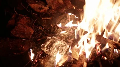 Adding Pot of Water to FIre Stock Footage 73063908