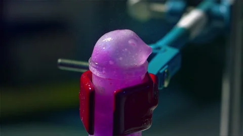 Adding a powder substance to a chemical experiment, the result is boiling Stock Footage 257033161