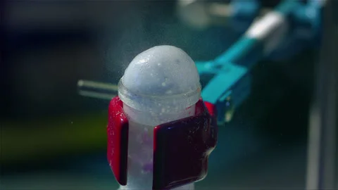 Adding a powder substance to a chemical experiment, the result is boiling Stock Footage 257033487