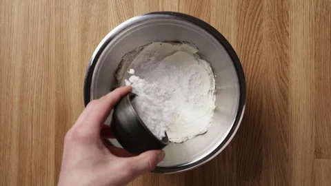 Adding Powdered Sugar To Ricotta In Bowl Top View Vídeos de archivo 334232564