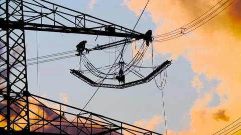 Adding power lines to a high voltage pylon 스톡 동영상 163078086