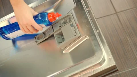 Adding Rinse Aid Detergent Dishwasher.Dishwasher Machine Rinse Aid Stock Footage 150389806