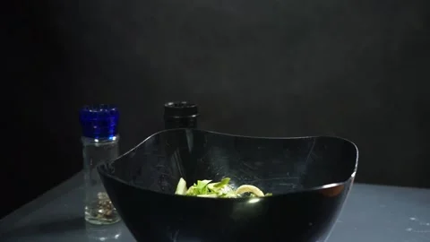 Adding salt and pepper spices cold-pressed olive oil Stock Footage 133647340