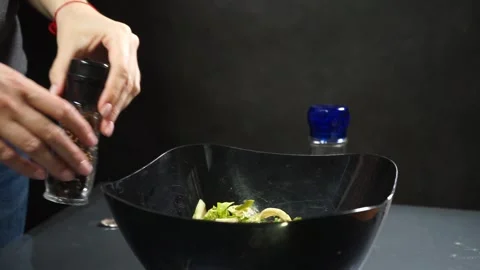 Adding salt and pepper spices Stock Footage 133647357