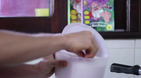 Adding salt to pan with carrots Stock Footage 35221586