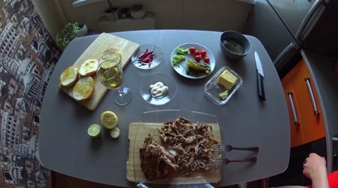 Adding salt to a pulled pork with female hands on the kitchen, pov Stock Footage 64663476