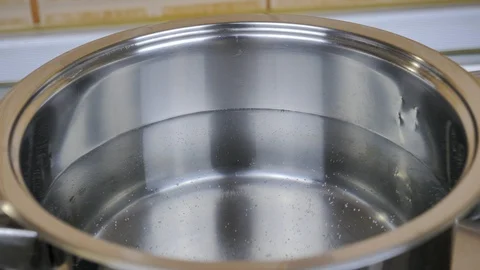 Adding salt into water Video stock 87301518