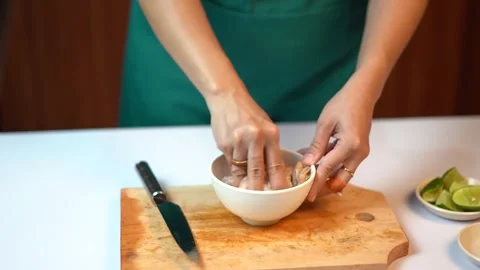 Adding Sauce and Marinating Raw Shrimps in a Bowl 스톡 동영상 334306535