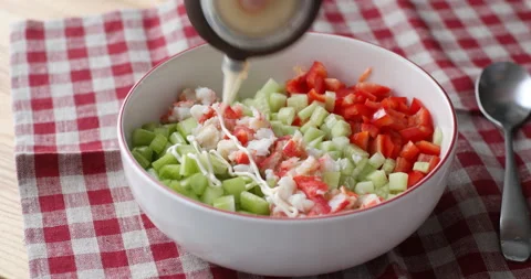Adding sauce into crab salad Stock-Footage 300578767