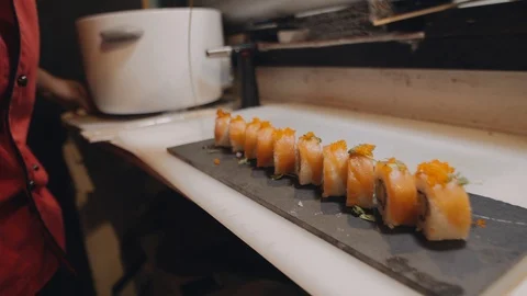 Adding sauce to sushi Stock Footage