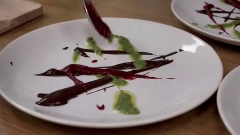 Adding sauces on plate Stock Footage 79507716