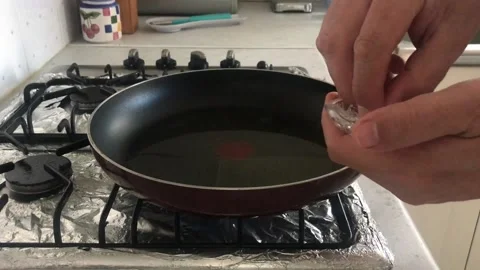 Adding Sault To A Pan Stock Footage 130916147