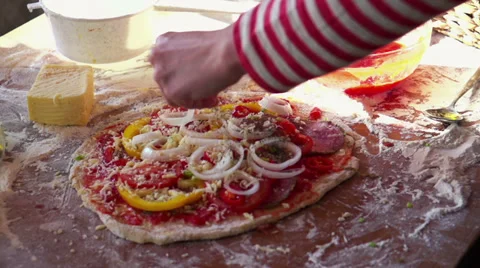 Adding seasoning to tasty pizza, super slow motion, shot at 240fps Stock Footage 36620050