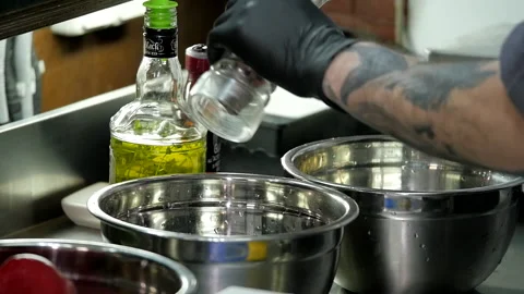 Adding Seasonings to the Marinade Video stock 131634672