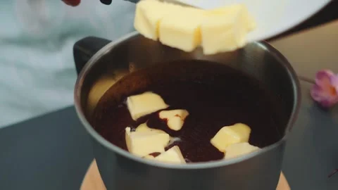 Adding Soft Butter to Hot Chocolate Stock-Footage 252479498