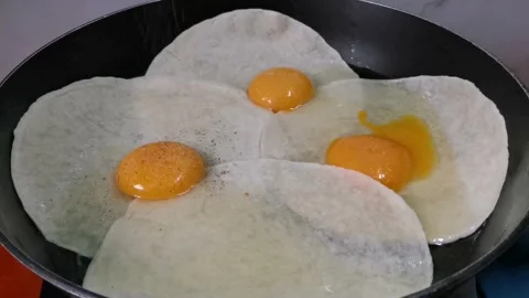 Adding Some Black Ground pepper on Tortilla Wraps Stock Footage 162876511