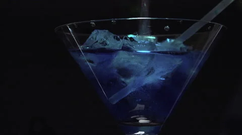 Adding sparkling water over Blue lagoon Stock Footage 55175776