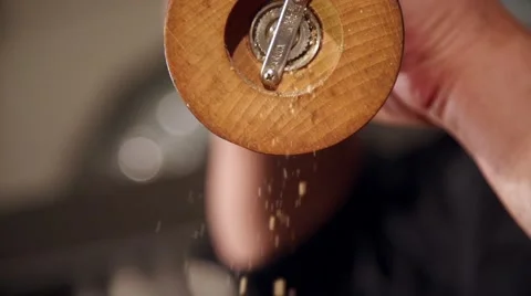 Adding species to meal in slow motion Stock Footage 67867134