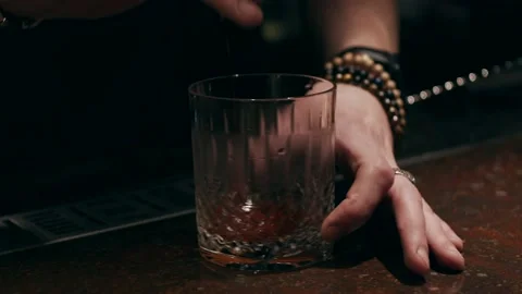 Adding spice in glass Stock Footage 136639187