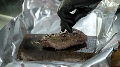 Adding Spice to Meat Stock Footage 132106232