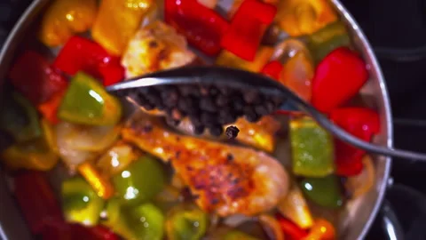 Adding spices to the chicken closeup in super slow motion 1000fps Stock Footage 257062053