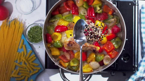 Adding spices to the chicken closeup in super slow motion 1000fps Stock Footage 257063798